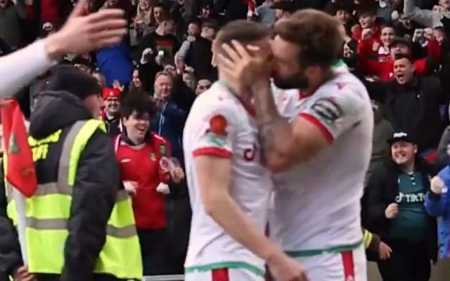  Footballer scores a last-minute stunner, teammate kisses him