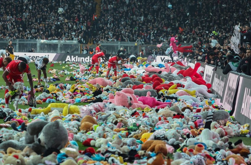  Besiktas fans shower football pitch with stuffed toys as statement of solidarity for earthquake-hit kids